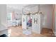 Playful bedroom featuring a unique indoor playhouse, and room for a desk and decor for children at 41 Selma Dr, Mooresville, NC 28115