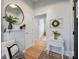 Inviting entryway with light walls, wood accents, and stylish decor creating a warm ambiance at 41 Selma Dr, Mooresville, NC 28115