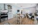 Open floor plan featuring kitchen, dining and living room areas in a brightly lit space at 41 Selma Dr, Mooresville, NC 28115
