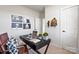 Home office space with a work desk, an office chair, decor, and a neutral color palette at 411 Sunharvest Ln, Indian Trail, NC 28079