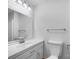 Neat bathroom featuring a white vanity, a large mirror, and a toilet at 475 Union Baptist Church Rd, York, SC 29745