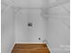 Laundry room with wire shelving, wooden floors and washer/dryer hookups at 475 Union Baptist Church Rd, York, SC 29745