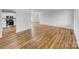 Open-concept living space featuring beautiful hardwood floors, with a glimpse of the kitchen at 475 Union Baptist Church Rd, York, SC 29745