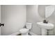 Small and simple bathroom with toilet and pedestal sink at 522 Fern Hill Rd # 17, Mooresville, NC 28117