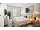 Cozy bedroom with a comfortable bed, natural light, minimalist decor, and a calming atmosphere at 522 Fern Hill Rd # 17, Mooresville, NC 28117