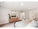 View of a bedroom with light colored walls, and a soft, comfortable looking bed at 522 Fern Hill Rd # 17, Mooresville, NC 28117