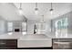 Bright and open kitchen with a large island and stainless steel appliances at 522 Fern Hill Rd # 17, Mooresville, NC 28117