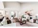 Spacious living room with high ceilings, abundant natural light, and stylish decor, open to other living spaces at 522 Fern Hill Rd # 17, Mooresville, NC 28117