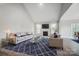 Spacious living room with high ceilings, fireplace, and comfortable seating arrangement with blue accents at 522 Fern Hill Rd # 17, Mooresville, NC 28117