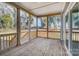 Spacious screened porch with wood flooring and outdoor views, perfect for relaxing at 522 Fern Hill Rd # 17, Mooresville, NC 28117