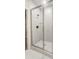 Elegant glass-enclosed shower with marble-style tile and modern fixtures at 522 Fern Hill Rd # 17, Mooresville, NC 28117