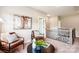 Sitting room showcasing seating, stylish decor, and a view of the staircase at 522 Fern Hill Rd # 17, Mooresville, NC 28117
