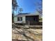 Charming single story home featuring a quaint, fenced front yard and screened porch at 529 Devine St, Chester, SC 29706