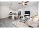 Inviting open-concept living room and kitchen featuring modern decor and stainless steel appliances at 5824 Patton St, Charlotte, NC 28269