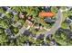 An aerial view showcases the property's location on a corner lot within a residential neighborhood at 6210 Skyline Dr, Charlotte, NC 28269