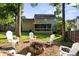 Backyard with fire pit area and patio at 6210 Skyline Dr, Charlotte, NC 28269
