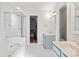 Bright bathroom featuring a soaking tub, stand up shower and large vanity at 6210 Skyline Dr, Charlotte, NC 28269