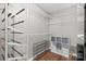 Spacious walk-in closet with custom shelving and shoe rack at 6210 Skyline Dr, Charlotte, NC 28269
