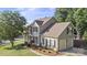 Charming two-story home featuring a two-car garage and manicured lawn with tasteful landscaping at 6210 Skyline Dr, Charlotte, NC 28269