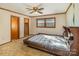 Bedroom with closet and window providing natural light featuring carpet floors and unique headboard at 624 Flicker St, Concord, NC 28027