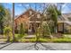 This charming brick home features mature trees and beautiful landscaping at 719 N Fulton St, Salisbury, NC 28144