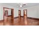 Spacious living room with beautiful hardwood floors and natural light with architectural details at 719 N Fulton St, Salisbury, NC 28144