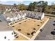 Aerial view of modern townhome community, featuring landscaped common areas and convenient parking at 722 Herlong Ave, Rock Hill, SC 29732