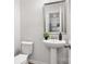Half bathroom with pedestal sink and gray trim at 722 Herlong Ave, Rock Hill, SC 29732