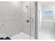 Bathroom shower with glass doors and marble tile at 722 Herlong Ave, Rock Hill, SC 29732