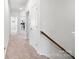 Upstairs hallway with carpet and doors at 722 Herlong Ave, Rock Hill, SC 29732