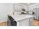 Modern kitchen with granite countertops, stainless steel appliances, and seating at the island at 722 Herlong Ave, Rock Hill, SC 29732