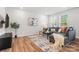 Cozy living room with plush seating and natural light at 722 Herlong Ave, Rock Hill, SC 29732