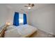 Cozy bedroom with a ceiling fan and natural light from the window at 746 Elders Story Rd, Fort Mill, SC 29708