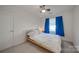 Bright bedroom featuring a ceiling fan and natural light from the window at 746 Elders Story Rd, Fort Mill, SC 29708