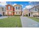 Inviting townhome featuring a well-maintained front lawn and a welcoming entrance at 746 Elders Story Rd, Fort Mill, SC 29708