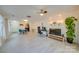 Bright living room featuring modern floors, ceiling fan and natural light, creating an inviting and airy atmosphere at 746 Elders Story Rd, Fort Mill, SC 29708