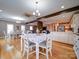 The formal dining room features hardwood floors and access to the kitchen and living room at 8509 Piccone Brook Ln, Charlotte, NC 28216