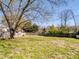 Spacious backyard offering plenty of room for outdoor activities and gardening at 8539 Glenway Ct, Charlotte, NC 28226