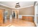 Spacious living room with hardwood floors, large window, and classic detailing creates an inviting atmosphere at 8704 Dartmoor Pl, Mint Hill, NC 28227