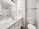 Clean bathroom featuring a white vanity and a shower-tub combo at 89 Fifth St, York, SC 29745
