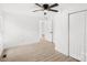 Inviting bedroom with modern ceiling fan and spacious closet at 902 Grace St, Kings Mountain, NC 28086