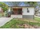 Charming single-story home with a cozy front porch, fresh paint, and black trim at 902 Grace St, Kings Mountain, NC 28086