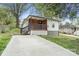 Inviting single-story home with a spacious driveway and charming front porch at 902 Grace St, Kings Mountain, NC 28086