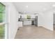 Modern kitchen with white cabinetry, stainless steel appliances, and bright natural light at 902 Grace St, Kings Mountain, NC 28086