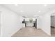 Bright, open-concept living space with recessed lighting and sleek, modern flooring at 902 Grace St, Kings Mountain, NC 28086