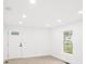 Bright, light-filled living area with fresh paint and new flooring, ready for personalization at 902 Grace St, Kings Mountain, NC 28086