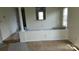 Bright living room with neutral walls, carpet, and charming architectural details, offering a cozy atmosphere at 9035 Jm Keynes Dr # 39, Charlotte, NC 28262
