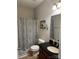 Full bathroom featuring a shower/tub combo, dark granite countertops and tile flooring at 905 Roxburgh Ave, Rock Hill, SC 29732