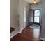 Entryway with hardwood floors and a storm door leading to the outside, great for curb appeal at 905 Roxburgh Ave, Rock Hill, SC 29732