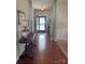 Hallway features wood flooring, and elegant furniture pieces with decorative lighting at 905 Roxburgh Ave, Rock Hill, SC 29732